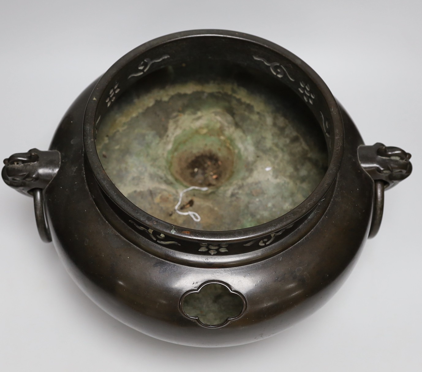 A Japanese bronze tripod jardinière, Meiji period, 26cms high